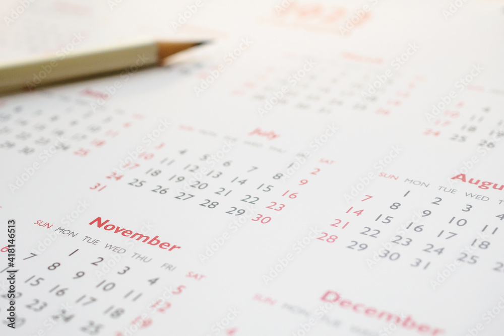 white pencil on calendar background business planning appointment meeting concept white pencil on calendar background business planning appointment meeting concept