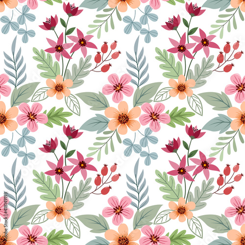 Colorful hand draw flowers seamless pattern on white color background for fabric, textile, wallpaper, wrapping paper, backdrop, and phone case. © Orlandoit
