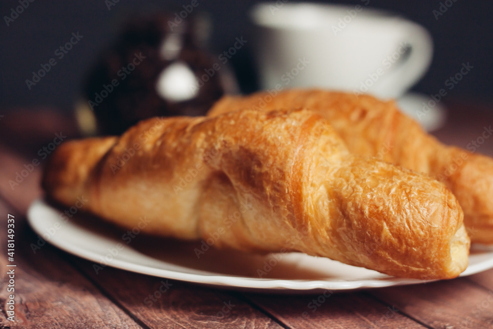 fresh croissants on a saucer table setting breakfast fresh croissants on a saucer table setting breakfast