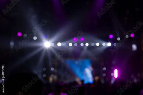 Bright colorful stage lights of blur background, Bokeh concert light © media-ja