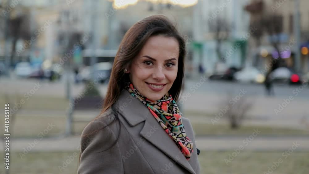 Portrait of a young beautiful girl on the street in the city, a set of video clips. Portrait of a young beautiful girl on the street in the city, a set of video clips.
