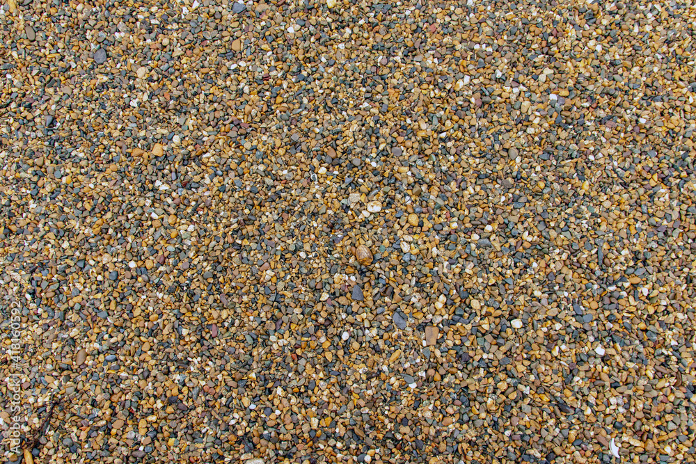 Chipped natural stone. Crushed stone from granite. Macro photo of rubble with place for text Chipped natural stone. Crushed stone from granite. Macro photo of rubble with place for text