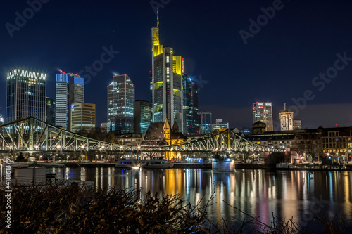 The skyline of Frankfurt at night at a cold day in winter.