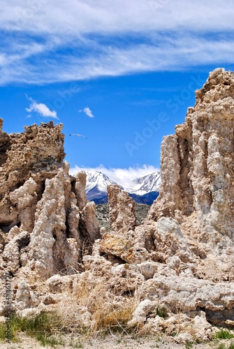 Mono Lake is a saline soda lake in Mono County, California. Many columns of limestone, called tufa, rise above the surface of Mono Lake. The Sierra Nevada Mountain Range is in the background. photo