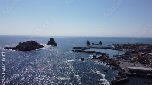 Descending flight view with drone of Acitrezza bay in Sicily Italy