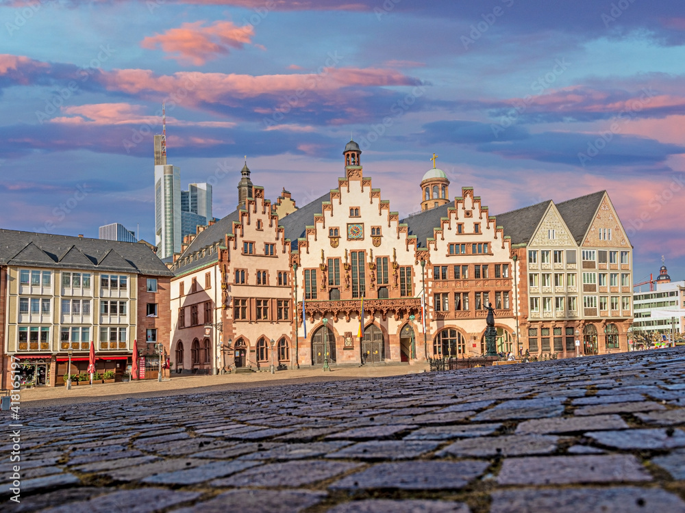 Panoramic view over historic Frankfurt Römer square with city hall, cobblestone streets and old half-timbered houses in morning light