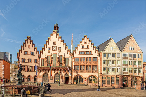 Panoramic view over historic Frankfurt Römer square with city hall, cobblestone streets and old half-timbered houses in morning light