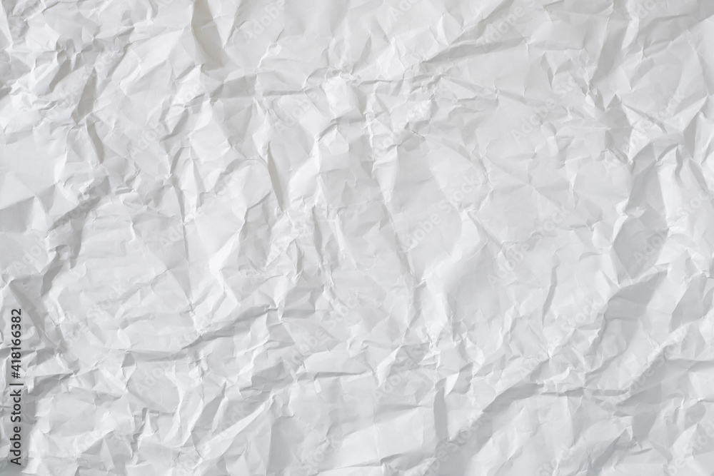 Obraz premium Crumpled white paper as a background.