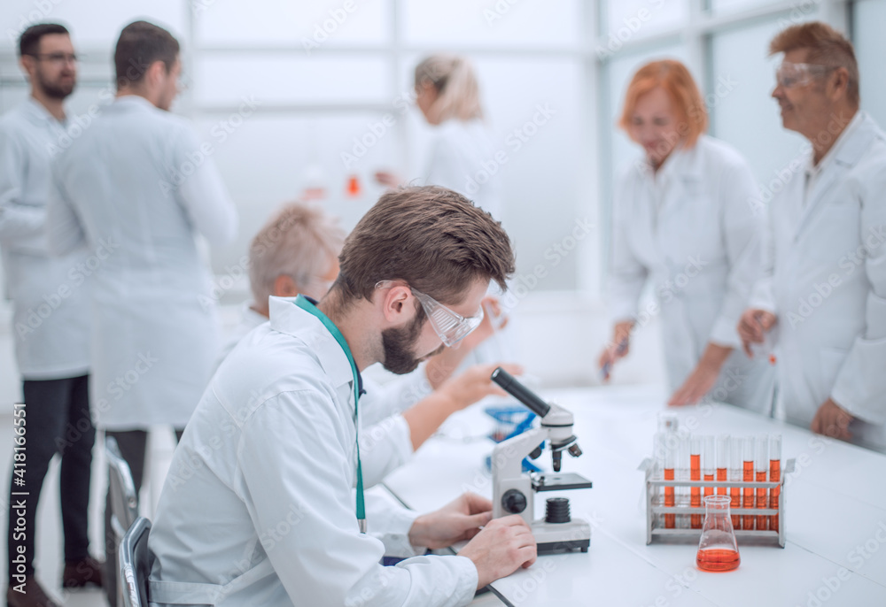 Fototapeta premium scientist conducting blood analysis in the laboratory .