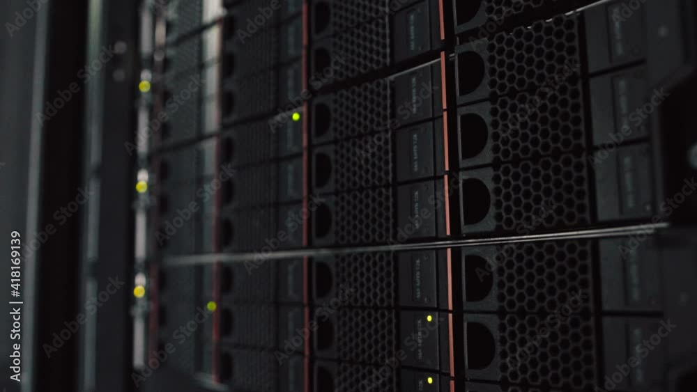 Network and data servers and panels in a server room of a data center or ISP with flickering lights