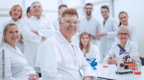 portrait of a successful supervisor and his team in the laboratory . © ASDF