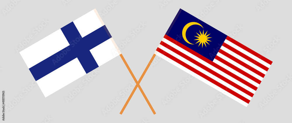 Crossed flags of Finland and Malaysia. Official colors. Correct proportion