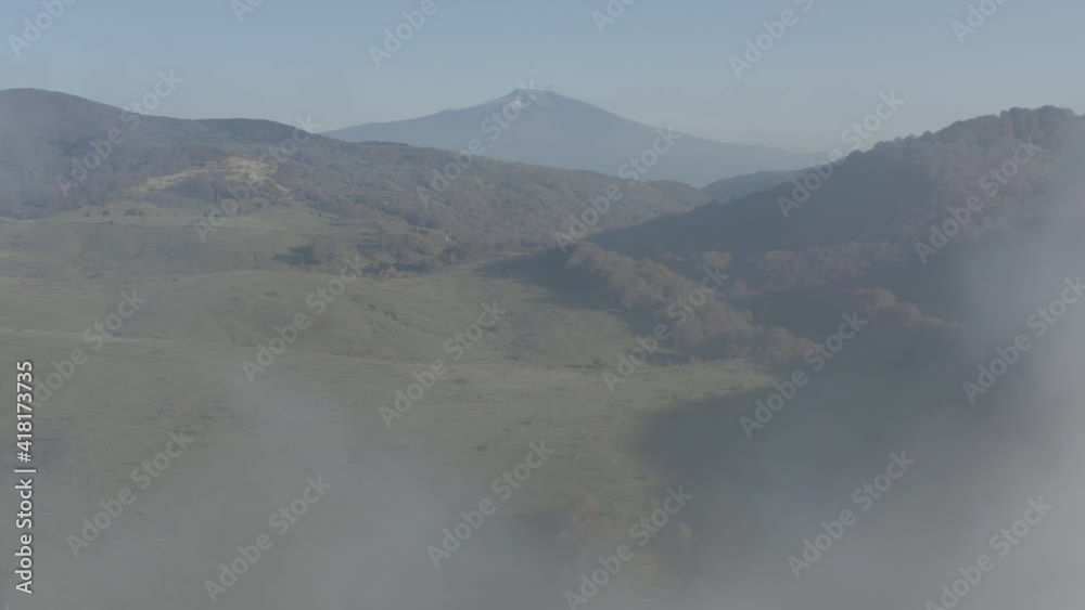 Lake Biviere in the heart of the Nebrodi mountains in Sicily. Lake in autumn with a view of the Etna volcano and the background of the Rocche del Crasto, the Tyrrhenian sea and the Aeolian Islands. Lake Biviere in the heart of the Nebrodi mountains in Sicily. Lake in autumn with a view of the Etna volcano and the background of the Rocche del Crasto, the Tyrrhenian sea and the Aeolian Islands.