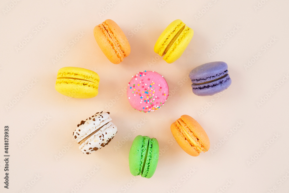 Tasty macarons on color background Tasty macarons on color background