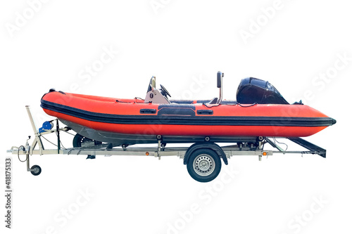 orange inflatable boat on a trailer isolated on white background