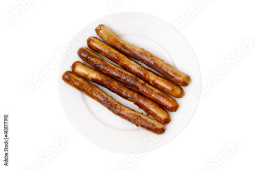 Grilled german sausages on a white plate isolated on white