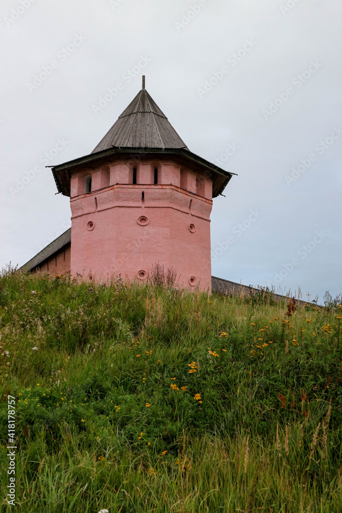 round tower under wooden hipped roof of Saviour Monastery of St. Euthymius in Suzdal, Russia