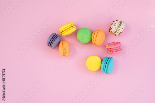Tasty macarons on pink background © Hazal