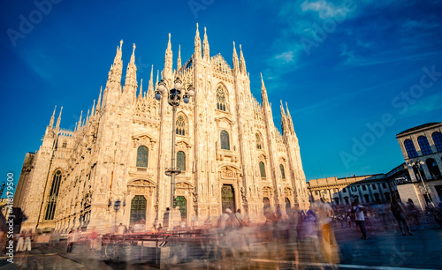 Beautiful Duomo of Milan attracting tourists at sunny day