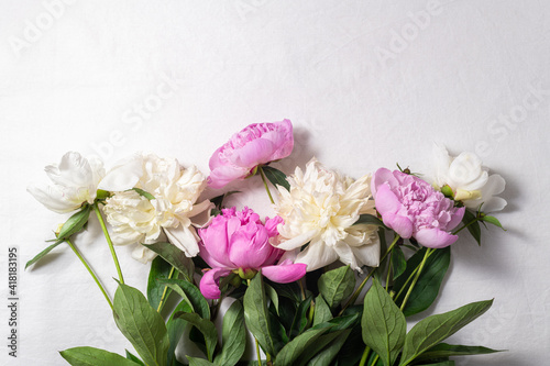 Bouquet of pink and white peony flowers on white background. Holidays concept, Mothers day, greeting card. Spring, flowering, summer flowers. Copy space © missmimimina