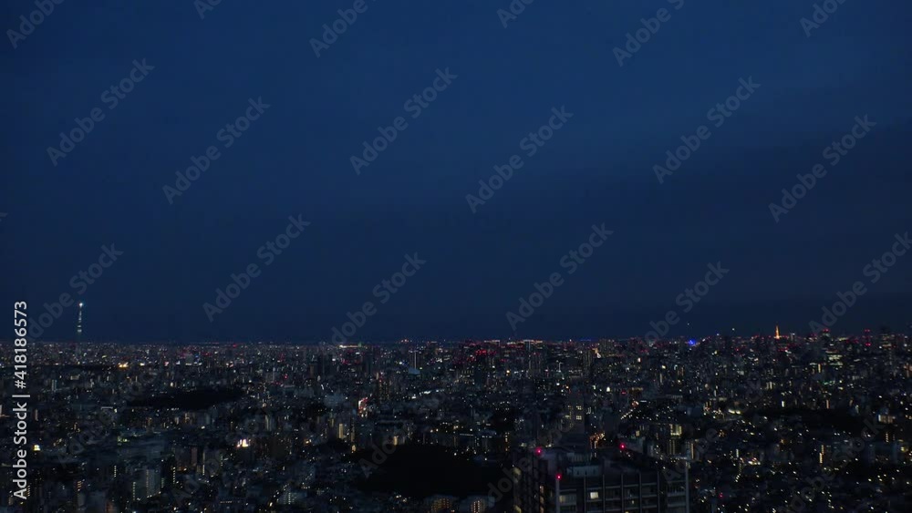 TOKYO, JAPAN : Aerial sunrise CITYSCAPE of TOKYO. View of dawn sky and buildings at downtown area. Japanese city life and urban metropolis concept. Long time lapse zoom in video, night to morning. TOKYO, JAPAN : Aerial sunrise CITYSCAPE of TOKYO. View of dawn sky and buildings at downtown area. Japanese city life and urban metropolis concept. Long time lapse zoom in video, night to morning.