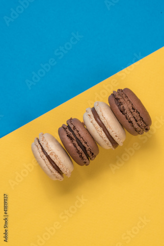 macarons on blue and yellow background