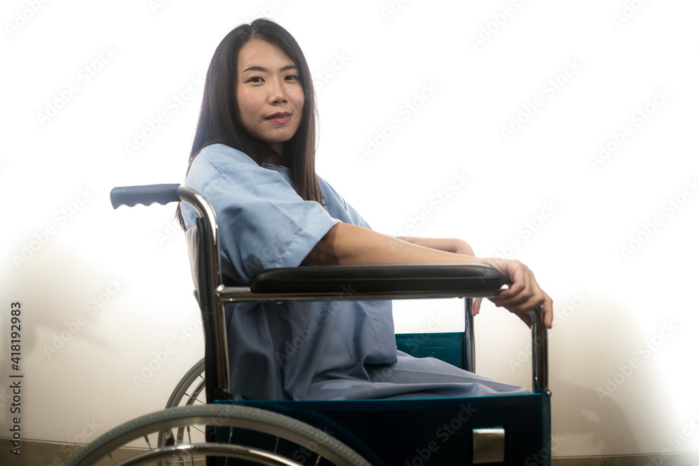 portrait of young happy and positive Asian Korean woman in hospital