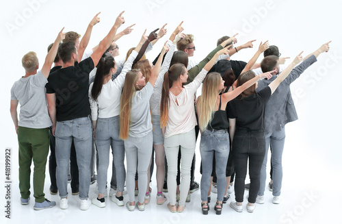 group of successful young people pointing, somewhere to the side