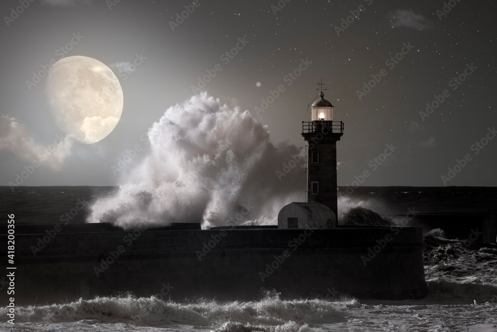 Old lighthouse in a stormy night