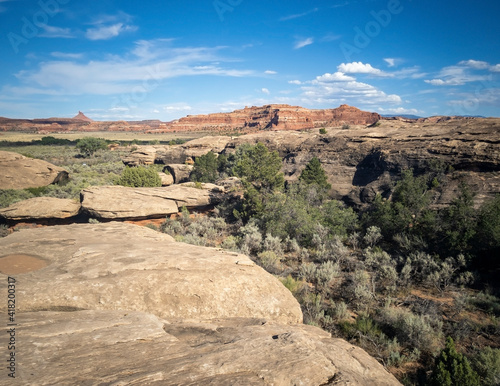 Surreal Canyonlands National Park sandstone domes and ice blue sky