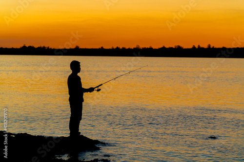 man fishing at the sunset brazil