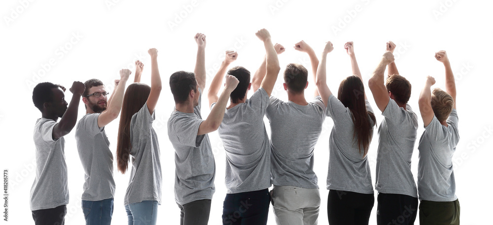 Obraz premium rear view. a group of young people showing their success