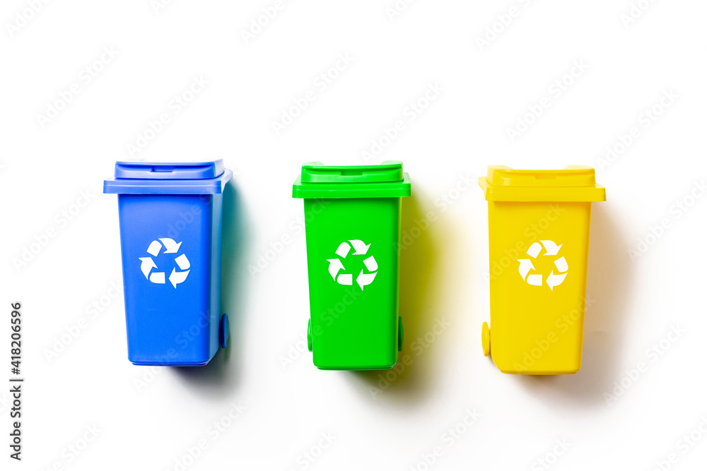 Recycling bins. Yellow, green, blue dustbin for recycle plastic, paper and glass can trash isolated on white background. Container for disposal garbage waste and save environment. Recycling bins. Yellow, green, blue dustbin for recycle plastic, paper and glass can trash isolated on white background. Container for disposal garbage waste and save environment.