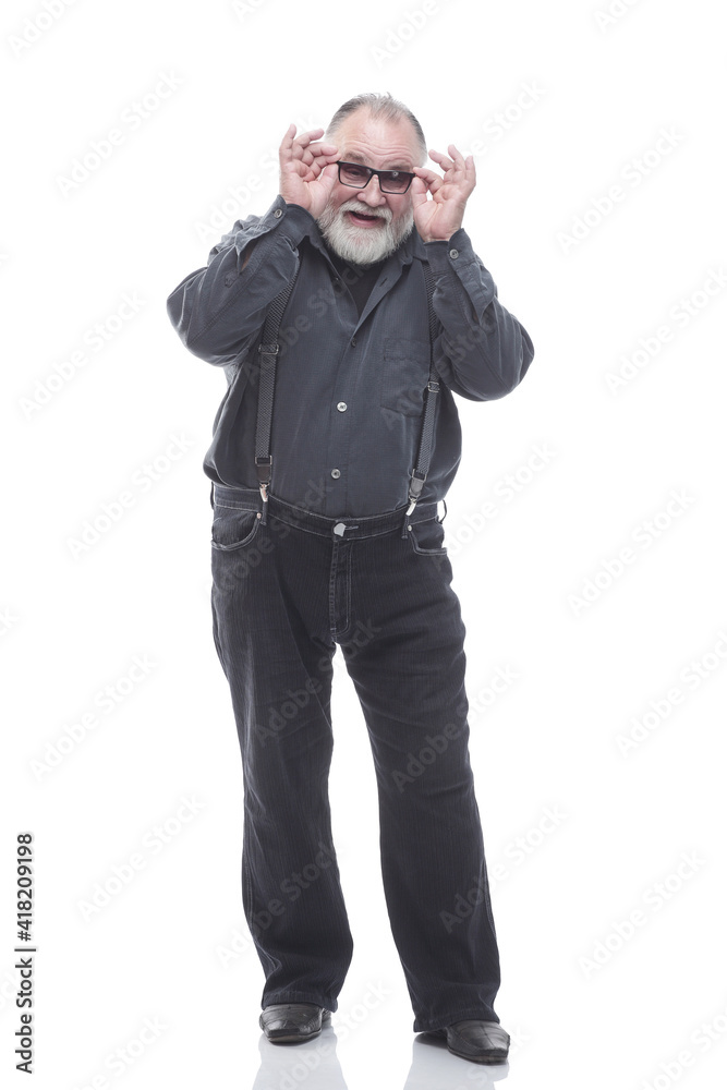 casual elderly man looking carefully through glasses. casual elderly man looking carefully through glasses.