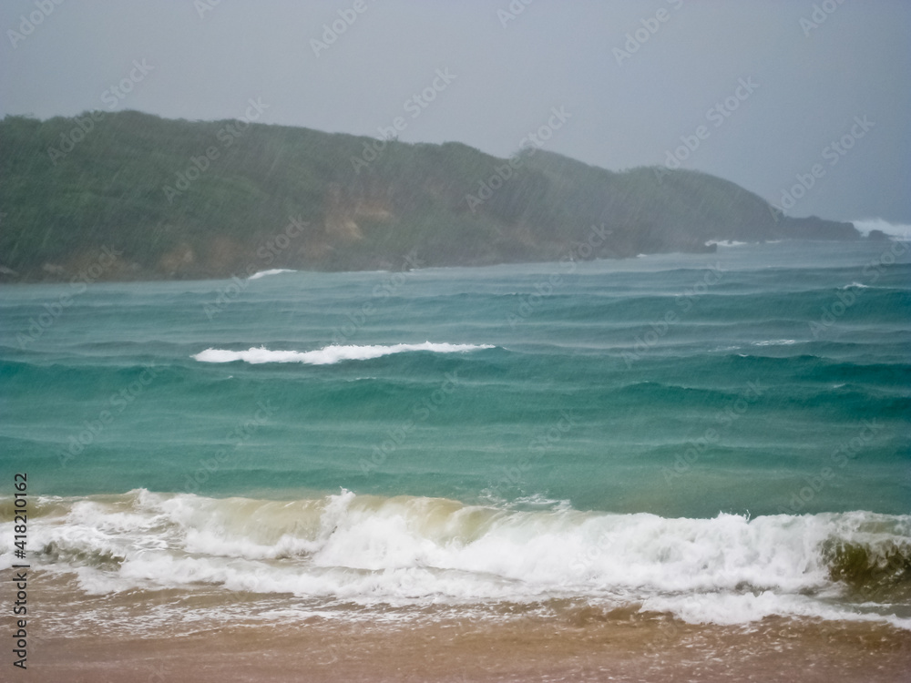 Rain storm over the ocean