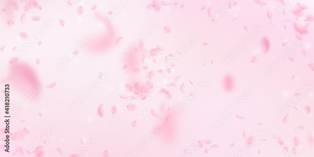 Sakura petals falling down. Romantic pink flowers explosion. Flying petals on pink wide background.