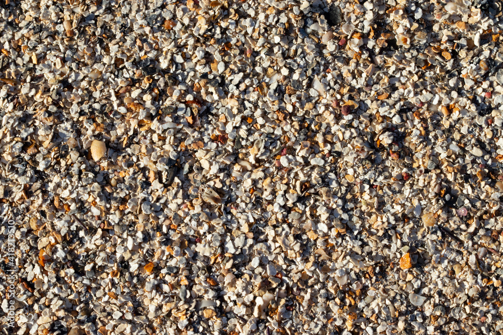 Gravel stones mixed with shells, background. Gravel stones mixed with shells, background.