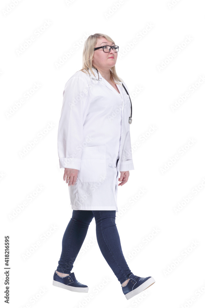 smiling paramedic in a white coat striding forward . smiling paramedic in a white coat striding forward .