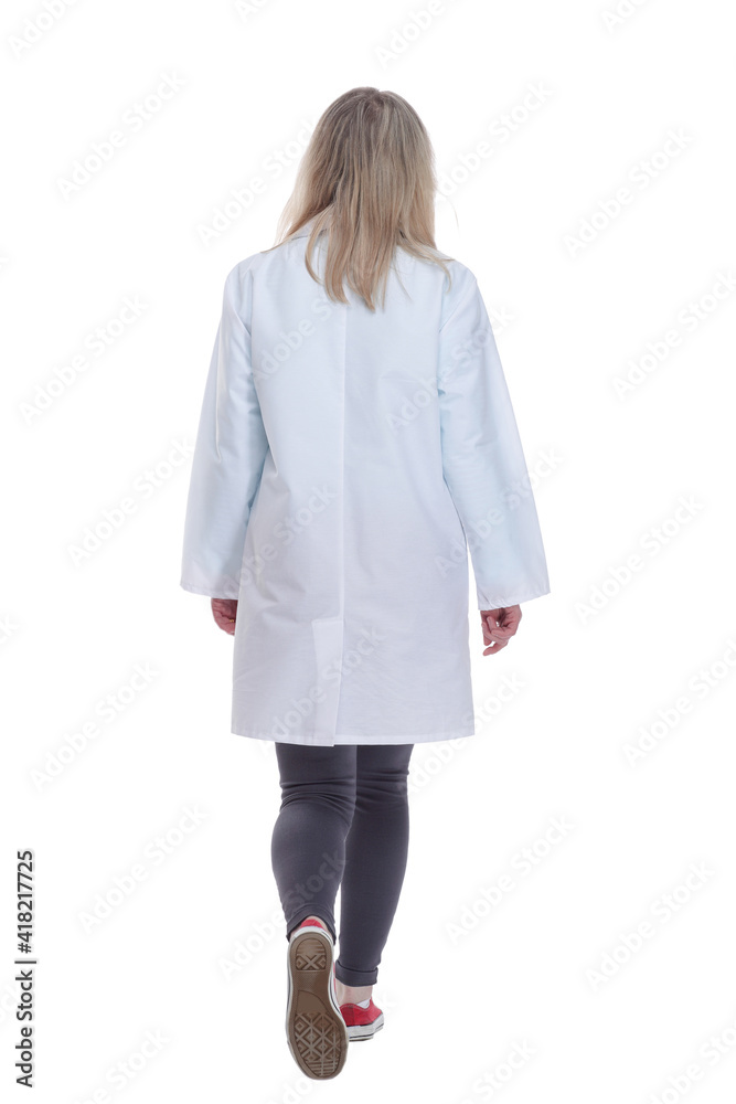 confident doctor with stethoscope striding away . isolated on a white background.