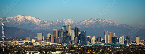 Down Town Los Angeles with snow capped mountains.