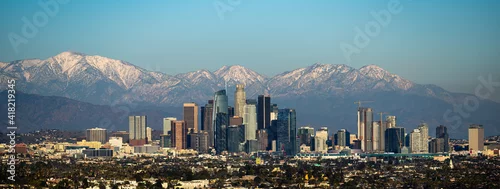 Obraz Down Town Los Angeles with snow capped mountains.