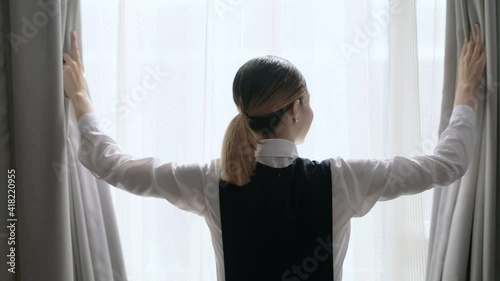 maid opened the curtains for the morning light. Eliminate the musty smell in the room
