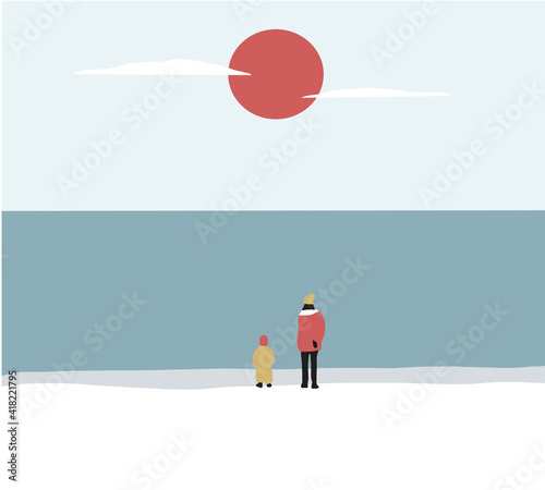 Woman with her son on the beach and looks at the sea in winter season. The boy is resting with his mother on the ocean coast. A child spends time with mom.
