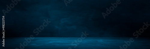 Empty blue concrete floor and blurred wall backgrounds, dark room,  interior, use for product display for presentation and cover banner design.
