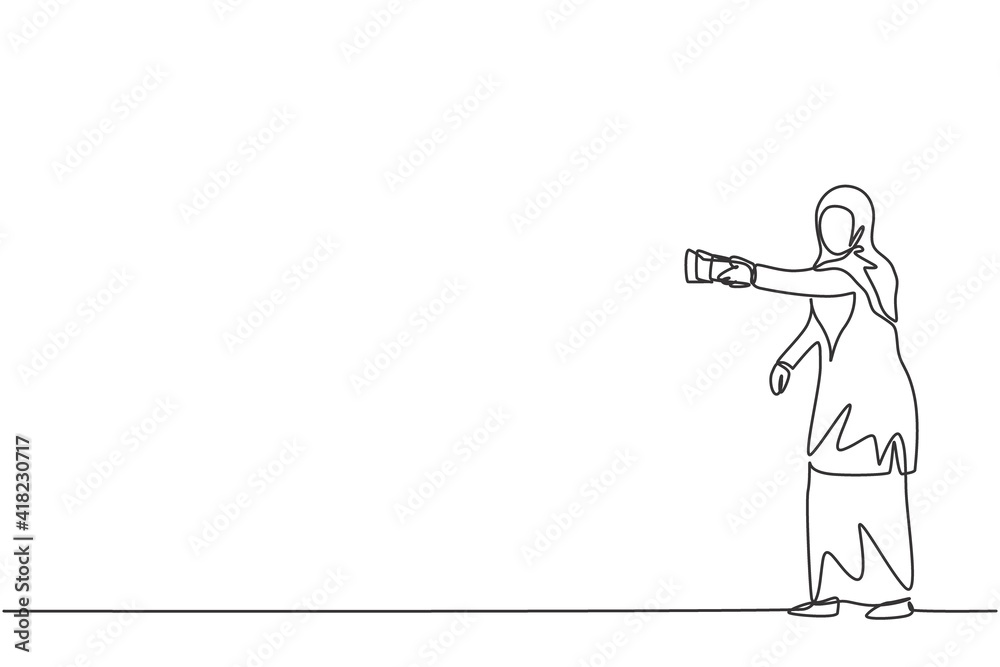Continuous one line drawing of young Arabic female worker holding flashlight to walk carefully. Success business manager minimalist concept. Trendy single line draw design vector graphic illustration