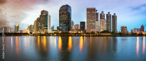Panorama of Bangkok Cityscape  Business district with Park in the City at dusk