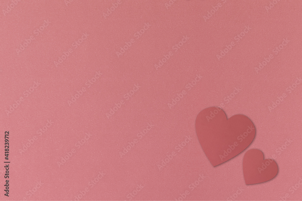 Two hearts, pastel pink background. Paper texture. Love. In love. Copy space Two hearts, pastel pink background. Paper texture. Love. In love. Copy space