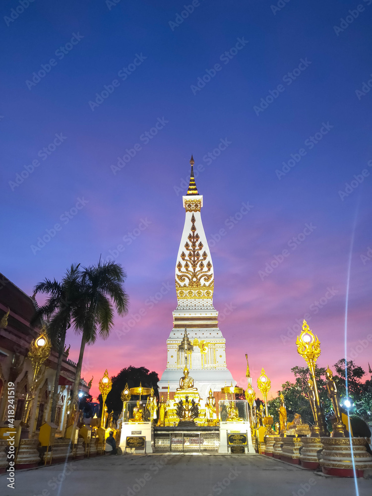 phra that phanom temple with the setting sun, Nakon phanom province, Thailand.