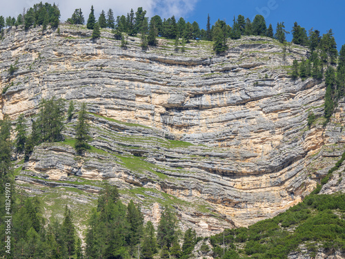 Fanes-Senes-Braies Nature Park. Dolomites, Italy. View of the stratifications of the Dolomites with significant folds in the upper part of the mountain. Geological studies. Structure of the Dolomites photo