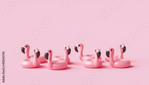 Minimal flamingo inflatable swimming pool ring and summer season on pink background with tropical holiday concept. 3D rendering.